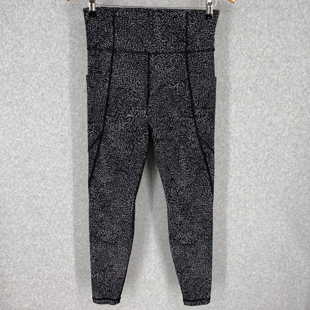Athleta Salutation Stash Pocket Rainwater Tight Size S Black Neutral Athletic